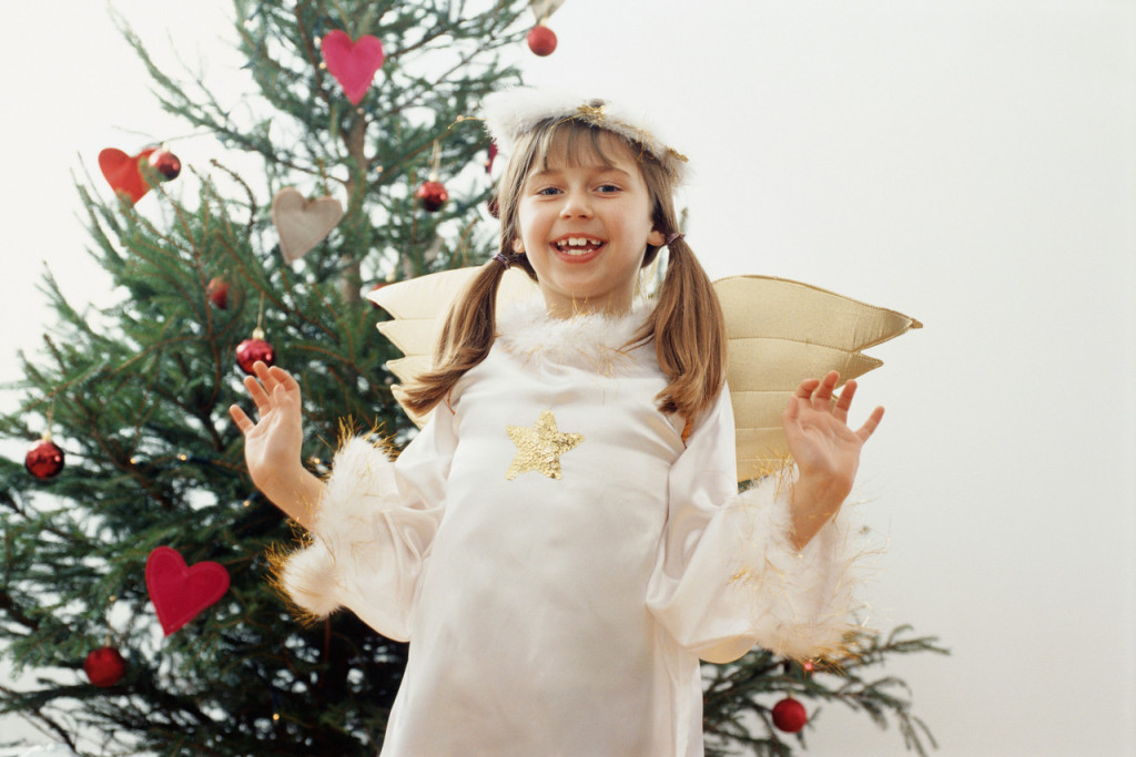 Smiling Young Girl Dressed as an Angel
